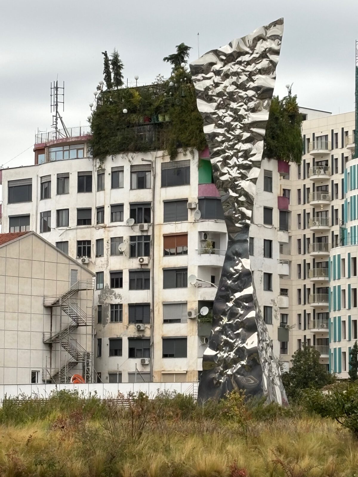 Evening pedestrians and bike lane near the Grand Park of Tirana